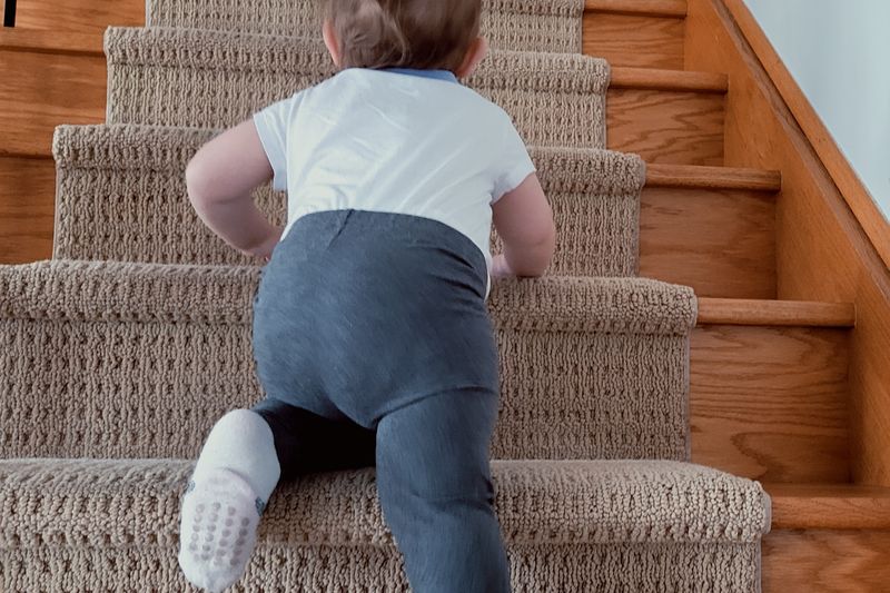 a child climbing the stairs